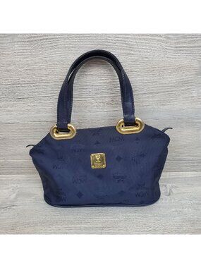 MCM monogrammed nylon mini handbag, navy and gold